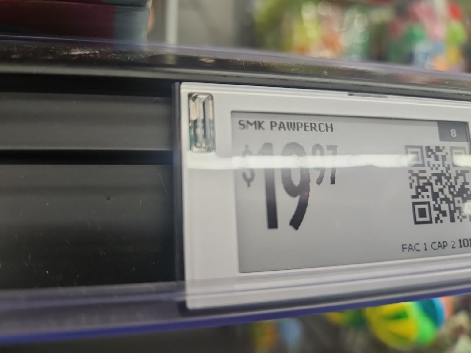 Close-up of the Walmart digital shelf label and LED area.